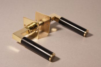Door handle Bauhaus square brass polished with black ebony incl. rosettes