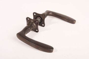 1920s door handle cast iron rust or tin color with rosettes