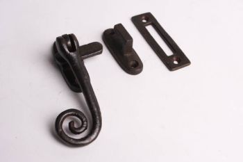 Country window catch with curl in rust or tin color with inlet plate or overlay hook