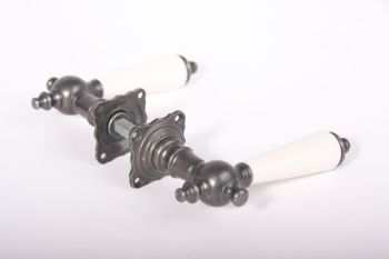 Door handles (pair) tin color with antique white porcelain +rosettes