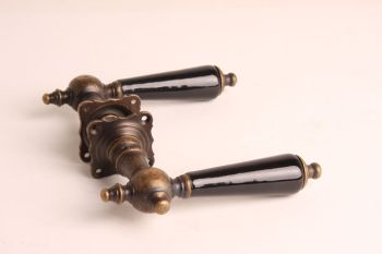 Door handle bronze antique with black porcelain per pair including rosettes