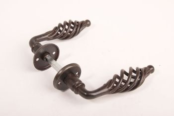 Door handles country wire handle rust color or tin color with round rosettes per pair