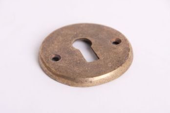 Rosette round with keyhole for beard key bronze antique