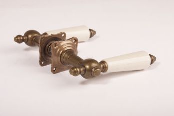 Door handles classic bronze antique with antique white porcelain and two rosettes